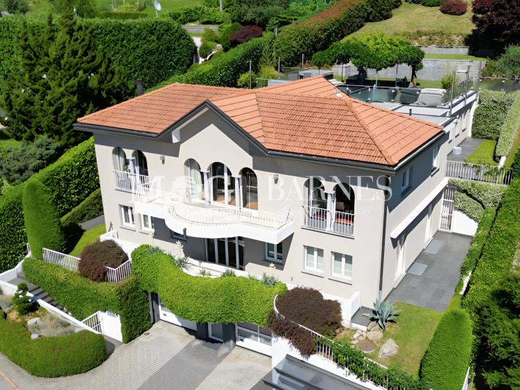 An elegant, stately villa nestled in the enchanting hills of Comano