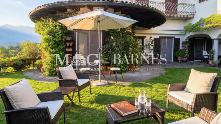 Comano: 4.5/5.5-room apartment with private garden and swimming pool
