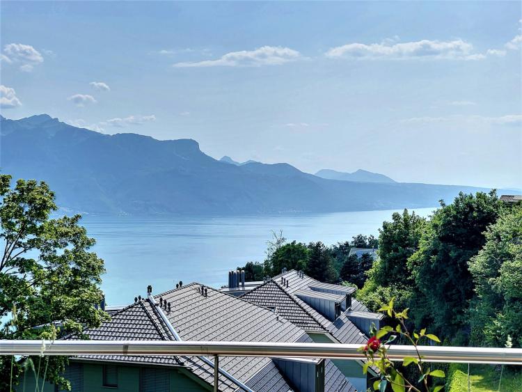 High standing duplex with breathtaking views of the lake! 