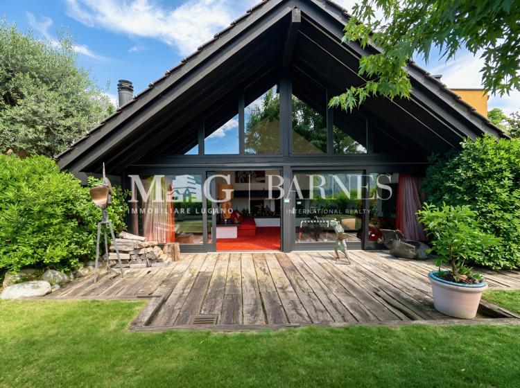Design villa in Comano with garden and open views, to renovate