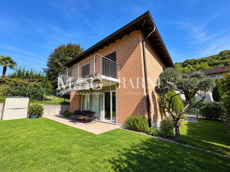 Vezia: Single-family home with a private garden