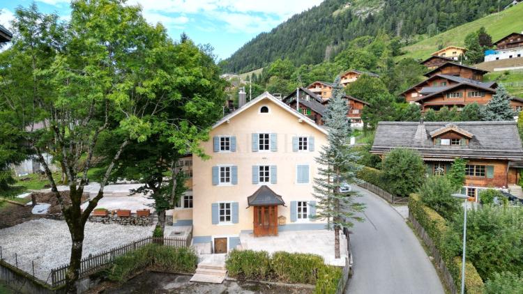 Traditional stone village house with large garden