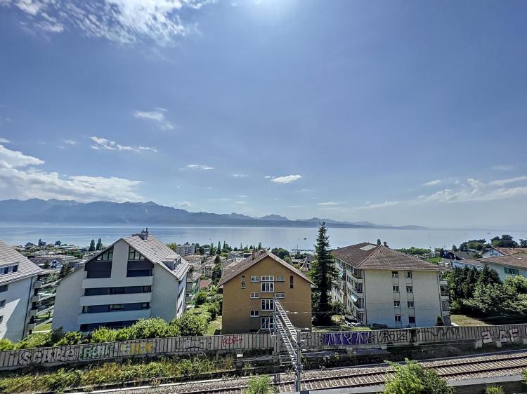 Les Plateires district - 120m² apartment with breathtaking views of the lake.