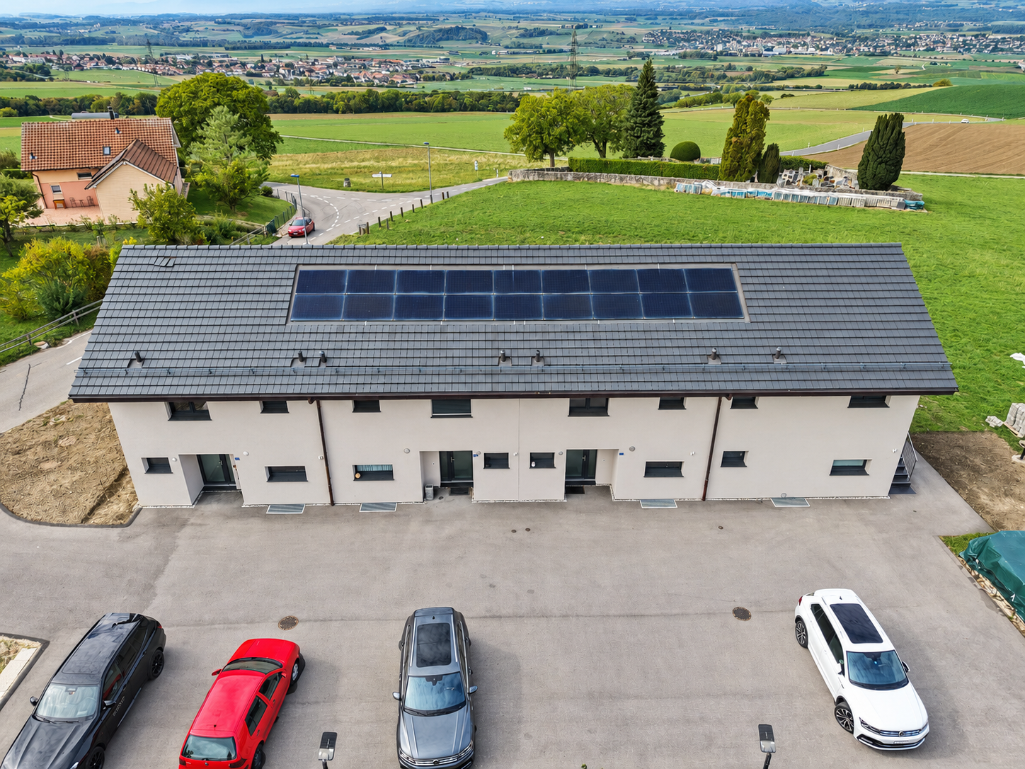 OOjx0_kaban-bien-vue-aerienne-d-un-lotissement-rural-ensoleille-6ad2326456d71856500255.png